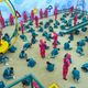 A scene from Squid Game, in which players carve honeycomb shapes.